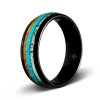 The luminary tungsten whiskey barrel dinosaur bone ring